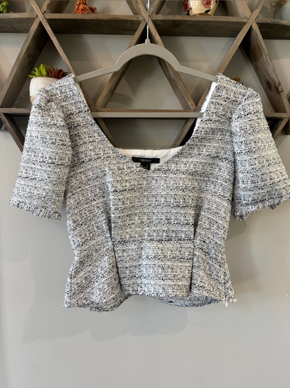 Forever 21 tweed peplum top with short puff sleeves. Size small.